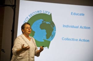 Woman presenting at climate action plan conference