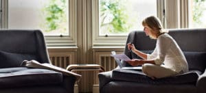 Woman working on laptop at home