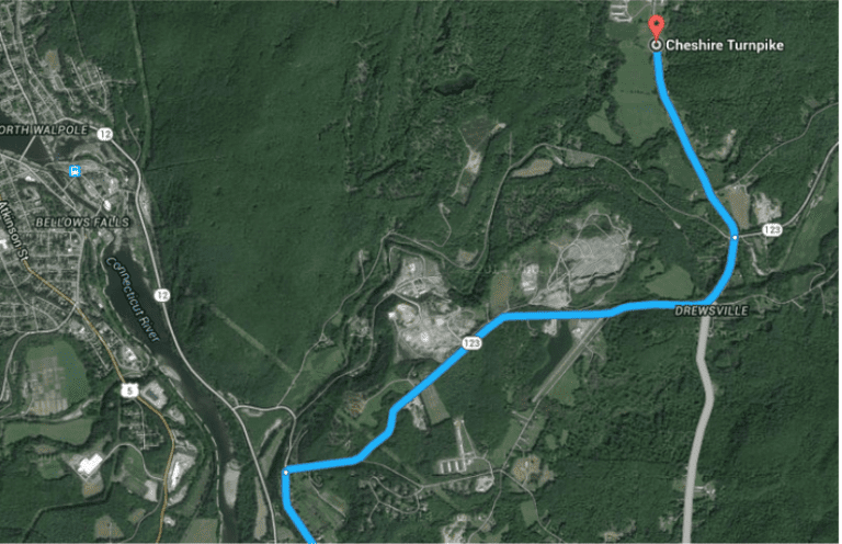 image | Antioch University Satellite map with a blue driving route from the bottom-left to Cheshire Turnpike, passing through Drewsville.