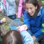 Anne Stires teachers engaged with students outdoors at Juniper Hill School for Place-based Education