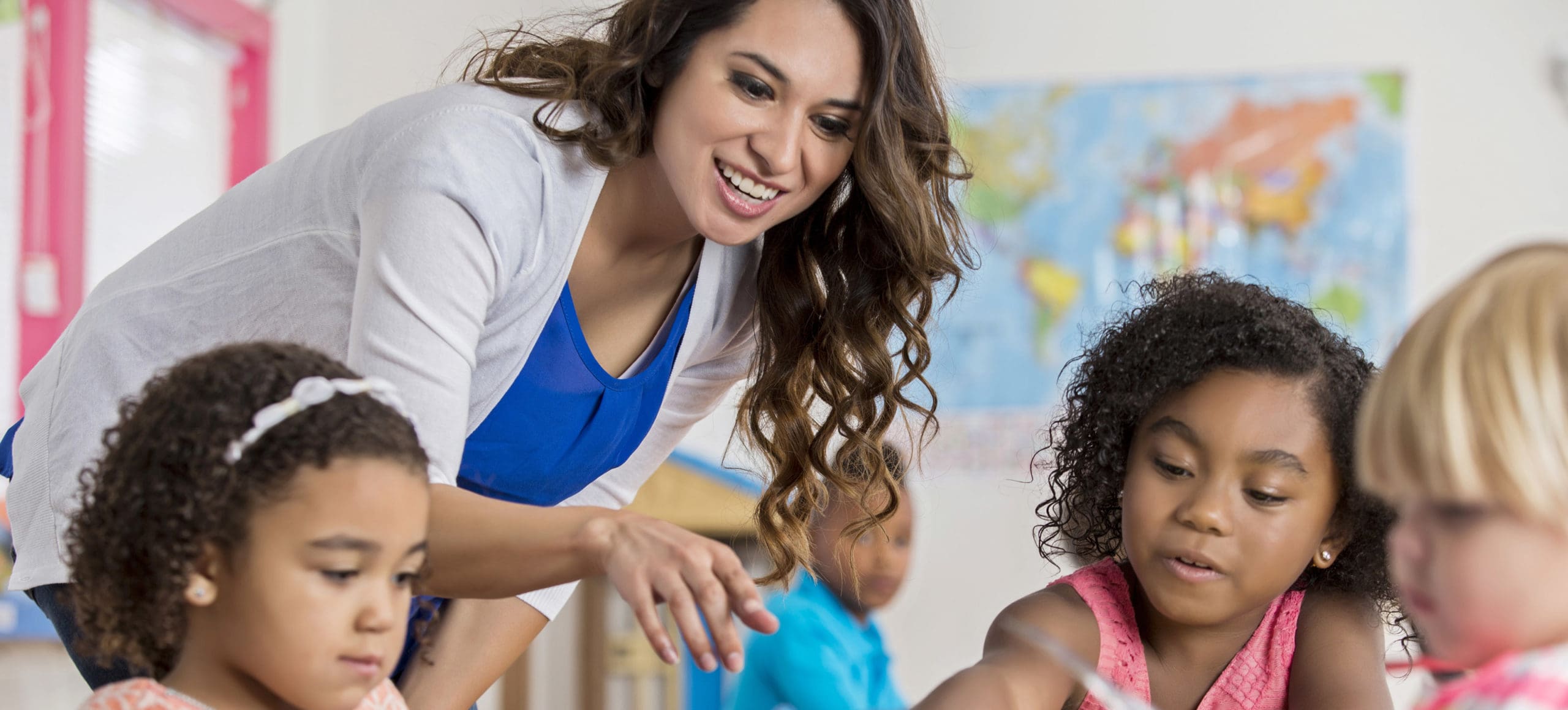AU_Hero_Image-AUS-Early-Childhood-education.jpg › Antioch University teacher with young students
