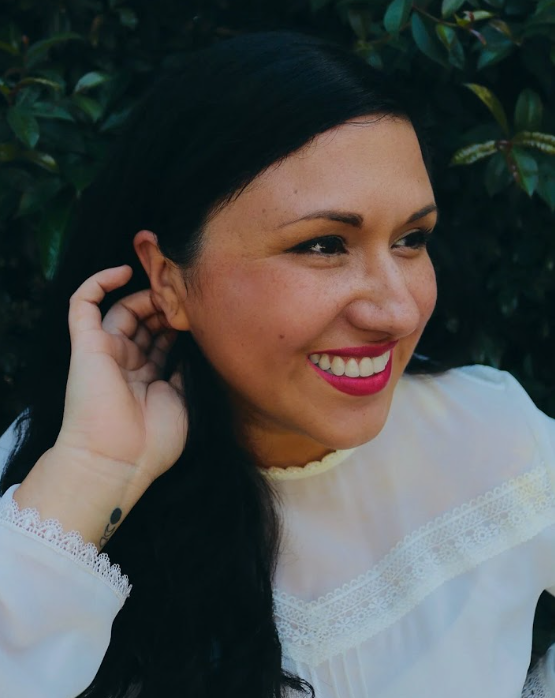 VanessaAngelicaVillarreal Antioch University Portrait of Vanessa Angélica Villarreal smiling outdoors