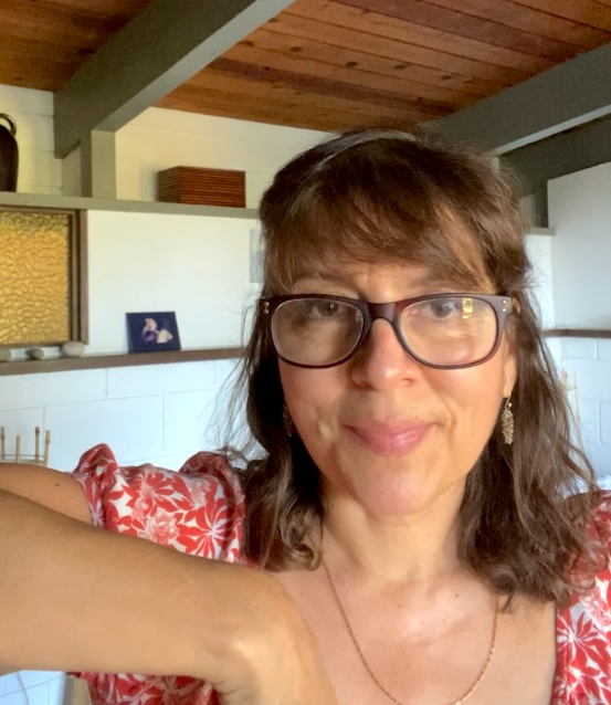 VeronicaGonzalezPena Antioch University Portrait of a woman with glasses in a red floral top likely a faculty or guest speaker photo Veronica Gonzalez Peña