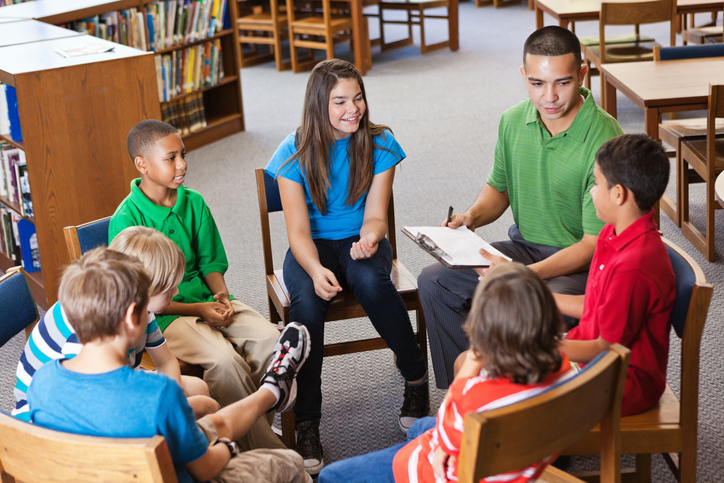 Mentor or teacher in discussion study group with students