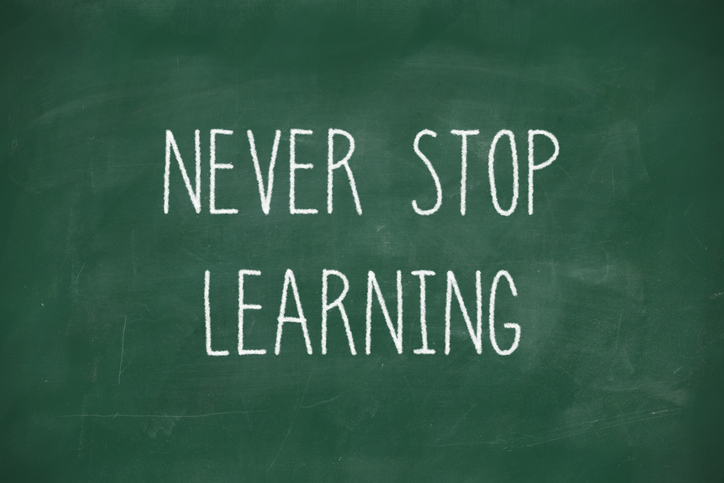 Never stop learning handwritten on blackboard