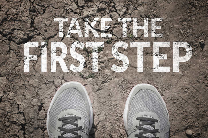 Take the first step written in front of a pair of feet