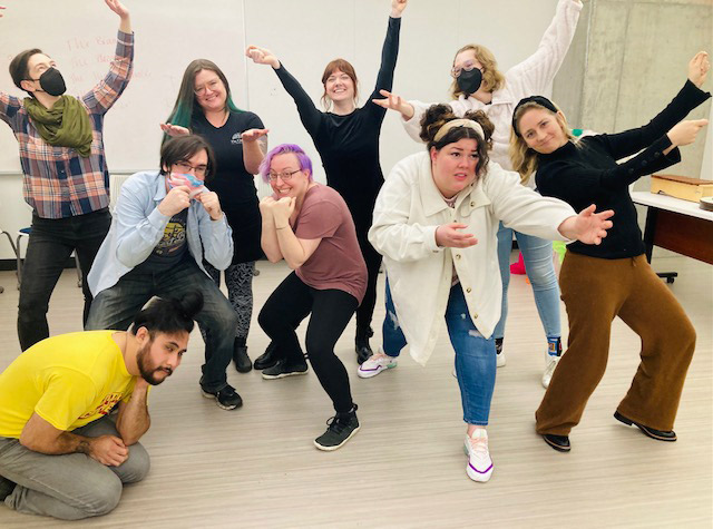 Student enacting different emotions with face and body.