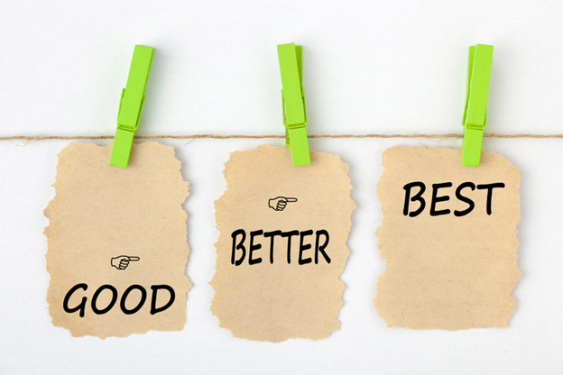 Tags held up by green clothespins that say good, better, best.
