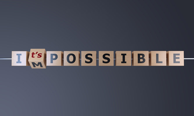 Blocks that spell impossible with the m moving to make the blocks say it's possible.