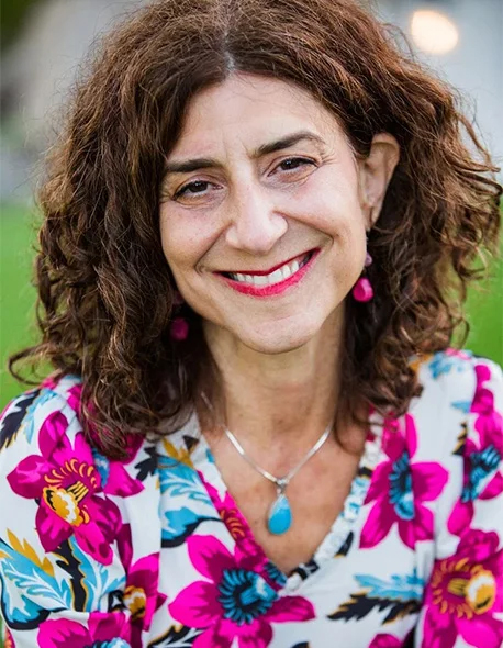 LV-Alt-Headshot-2025 › Antioch University A close up image of a woman in a flowered shirt