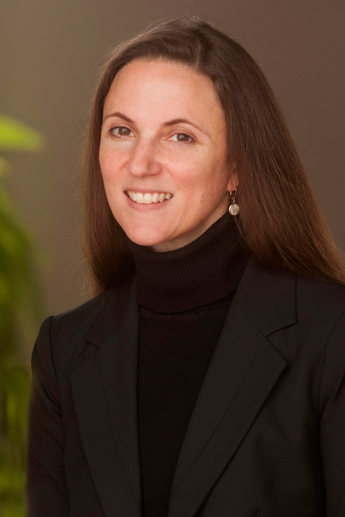 ExecutiveLeadership-MargaretMorgan › Antioch University A portrait of Margaret Morgan in a suit jacket on a neutral background.