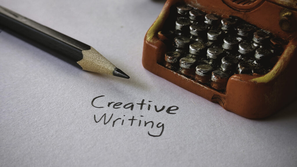 Creative Writing Close-up of a Pencil and Vintage Red Typewriter › Antioch University
